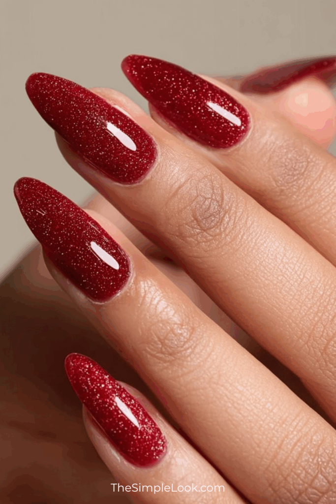 Festive Garnet Glitter Almond Nails