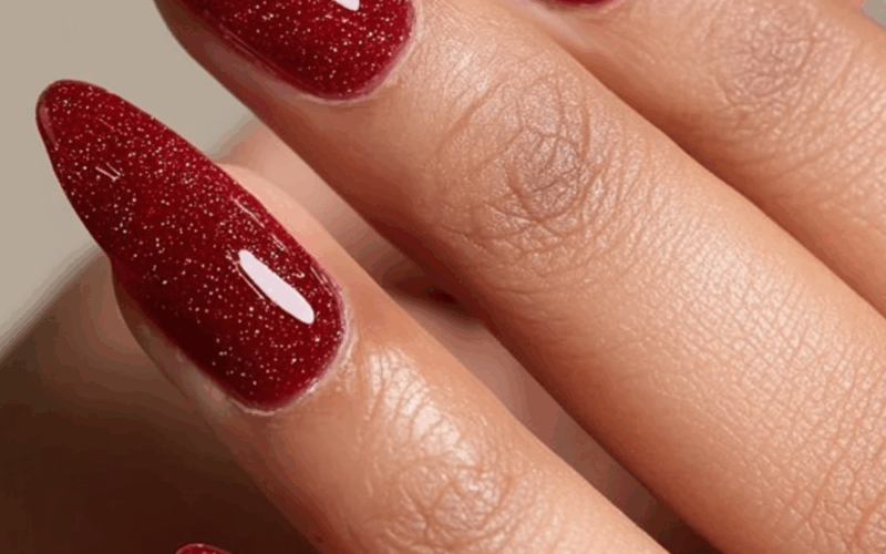 Festive Garnet Glitter Almond Nails