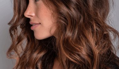 Dark hair with balayage highlights featuring caramel and honey tones for natural dimensional color